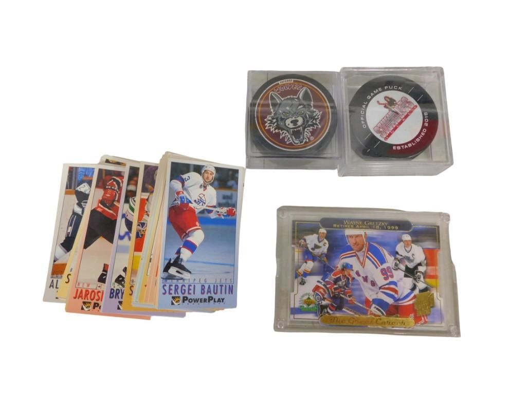 Hockey Lot including Cards, Wayne Gretzky, Chicago Wolves and Stumblers Pucks: Hockey Lot including Cards, Wayne Gretzky, Chicago Wolves and Stumblers Pucks All pictures are considered part of the description and should be examined carefully by bidders. Live Auctioneers is now o