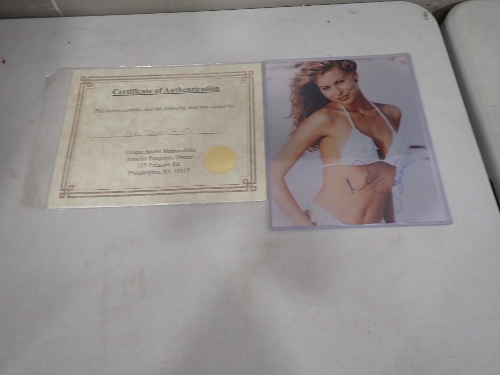 Niki Taylor Autographed 8x10" Photo with COA: Niki Taylor Autographed 8x10" Photo with COA All pictures are considered part of the description and should be examined carefully by bidders. Live Auctioneers is now offering Live Shipping through