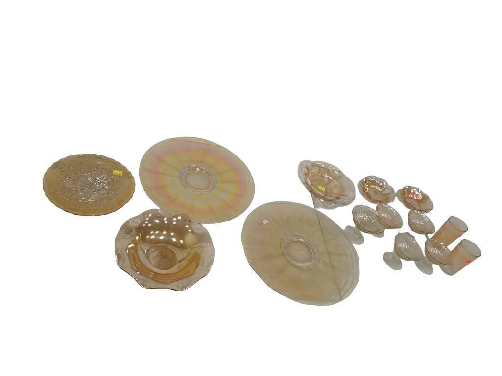 Large Lot of Iridescent Carnival Glass incl Serving Tray, Dessert Cups, Bowls, etc: Large Lot of Iridescent Carnival Glass incl Serving Tray, Dessert Cups, Bowls, etc All pictures are considered part of the description and should be examined carefully by bidders. Live Auctioneers is 