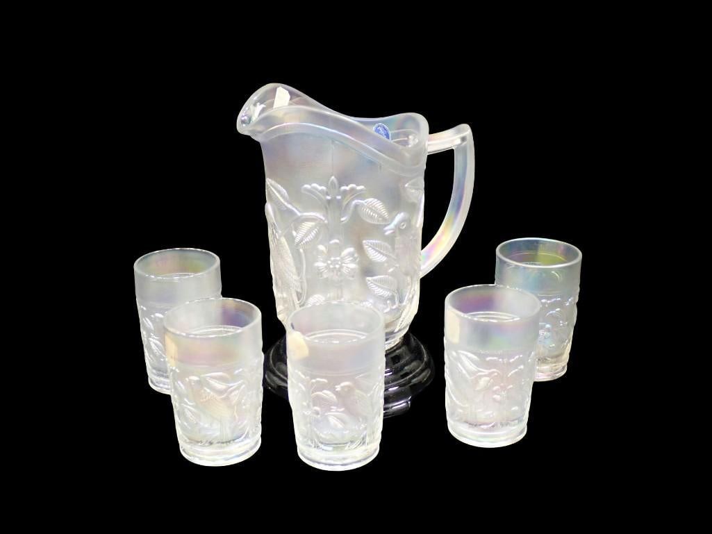 Imperial Glass Iridescent Pitcher 5 Glasses and a Stand for the Pitcher Bird Pattern: Imperial Glass Iridescent Pitcher 5 Glasses and a Stand for the Pitcher Bird Pattern All pictures are considered part of the description and should be examined carefully by bidders. Live Auctioneers i