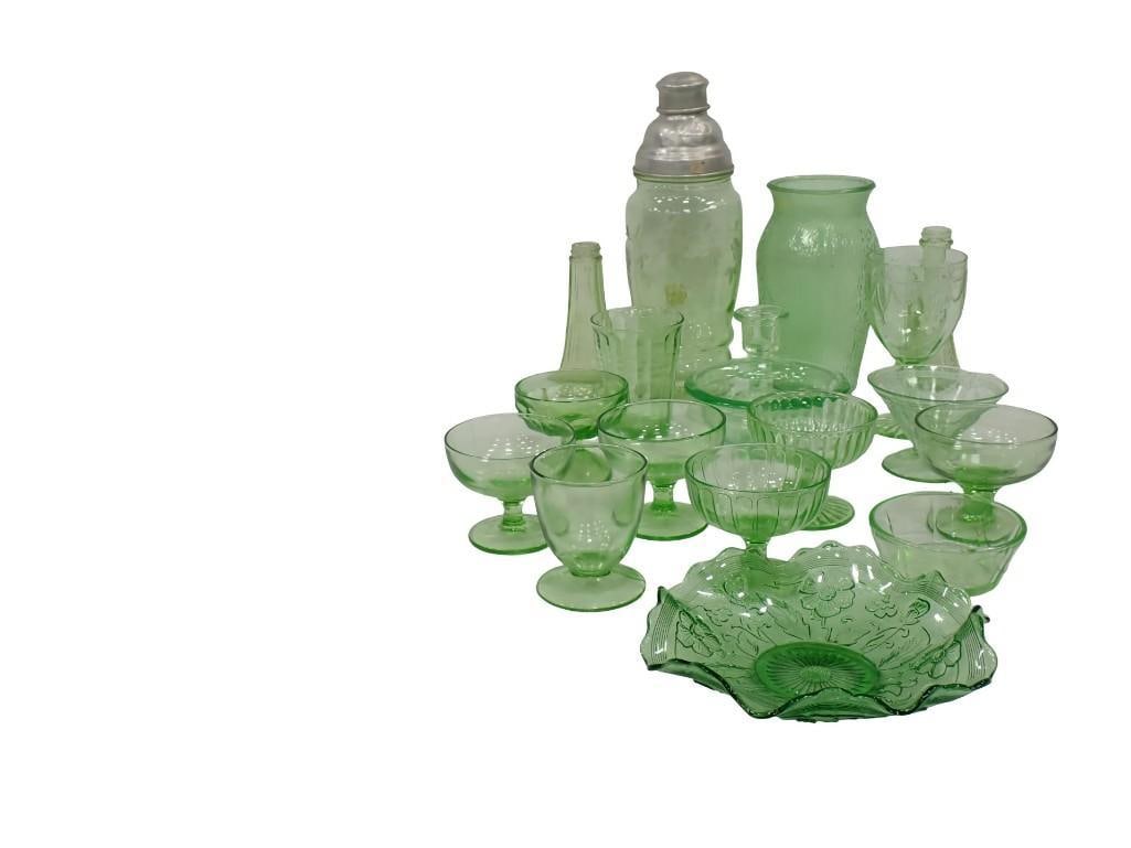 Lot of Uranium Glass or Green Depression Glass 17 Pc Total: Lot of Uranium Glass or Green Depression Glass 17 Pc Total including an etched grape and vine cocktail shaker. 1 Small Bowl is not uranium and does not glow under black light All pictures are co