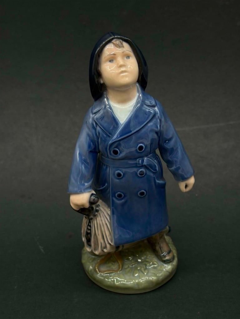 Royal Copenhagen 1st Quality 3556 Boy In Raincoat: Royal Copenhagen 1st Quality 3556 Boy In Raincoat. No Chips, Very Nice. . All Pictures Are Considered Part Of The Description And Should Be Examined Carefully By Bidders.. Live Auctioneers Is Now Offe