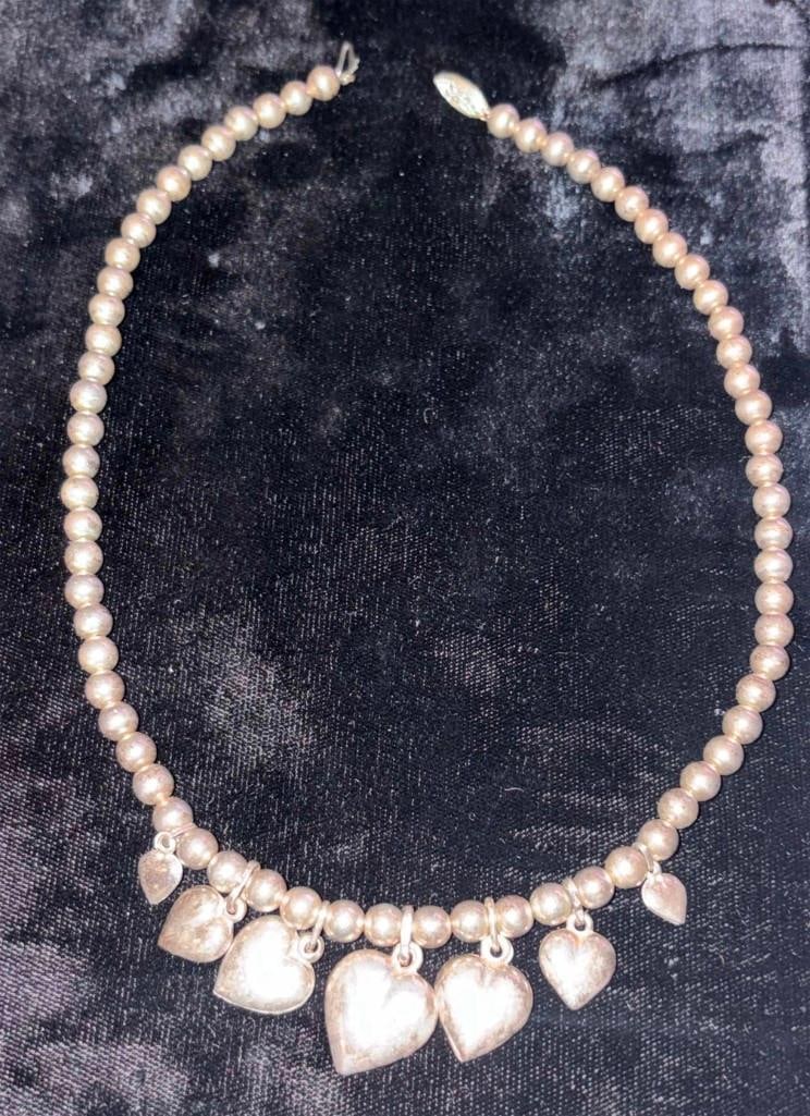 Vintage Puffy Heart Sterling Silver 16" Necklace: Vintage Puffy Heart Sterling Silver 16" Necklace. 20 Grams Excellent Condition. . All Pictures Are Considered Part Of The Description And Should Be Examined Carefully By Bidders.. Live Auctioneers Is