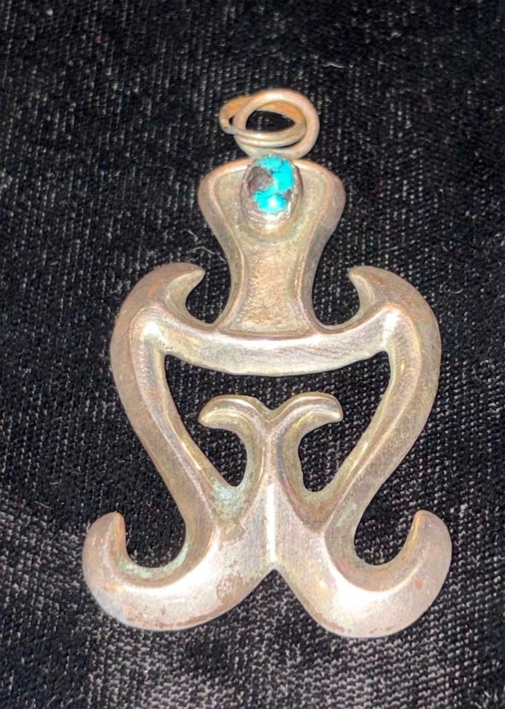 Vintage Navajo Sterling Silver And Turquoise Pendant: Vintage Navajo Sterling Silver And Turquoise Pendant. 20 Grams Total, Tested Good. . All Pictures Are Considered Part Of The Description And Should Be Examined Carefully By Bidders.. Live Auctioneers