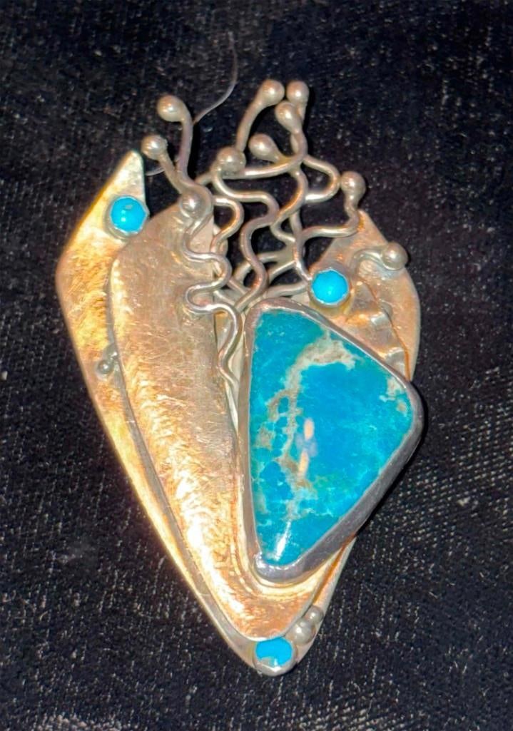 Modernist Sterling Silver And Turquoise Pendant: Modernist Sterling Silver And Turquoise Pendant. 20 Grams Total Signed Sterling. . All Pictures Are Considered Part Of The Description And Should Be Examined Carefully By Bidders.. Live Auctioneers