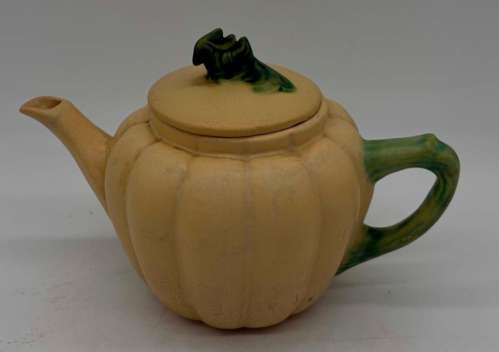Weller Pottery Tea Rose Pumpkin Shape With Green Bird Top: Weller Pottery Tea Rose Pumpkin Shape With Green Bird Top . Chip Inside And On Spout. 9" Long 6" Tall. All Pictures Are Considered Part Of The Description And Should Be Examined Carefully By Bidders..