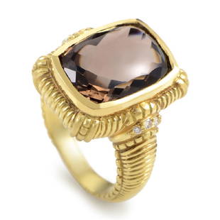 Judith Ripka 18K Yellow Gold Diamond Smokey Topaz Ring: Commanding yet sensuous, this Judith Ripka ring is a mysterious yet glamorous piece. A custom faceted smokey topaz graces the 18K yellow gold ring in a matte finish that is styled in a filigree