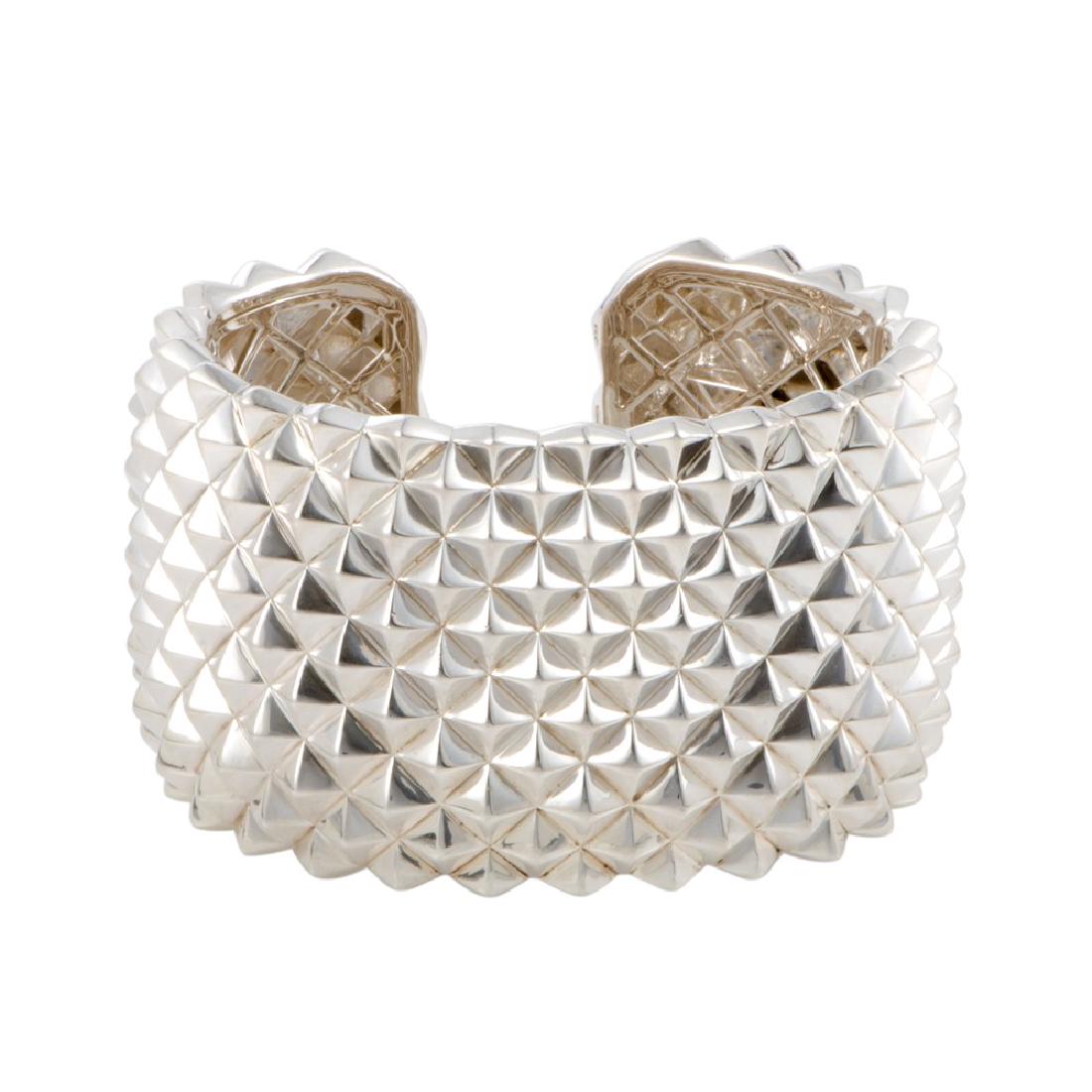 Stephen Webster Superstud Silver Wide Open Cuff: Add an attractive edgy touch to your ensemble with this stunning jewelry piece that combines chic style with offbeat allure, offering an incredibly fashionable look. The bracelet is presented by Steph