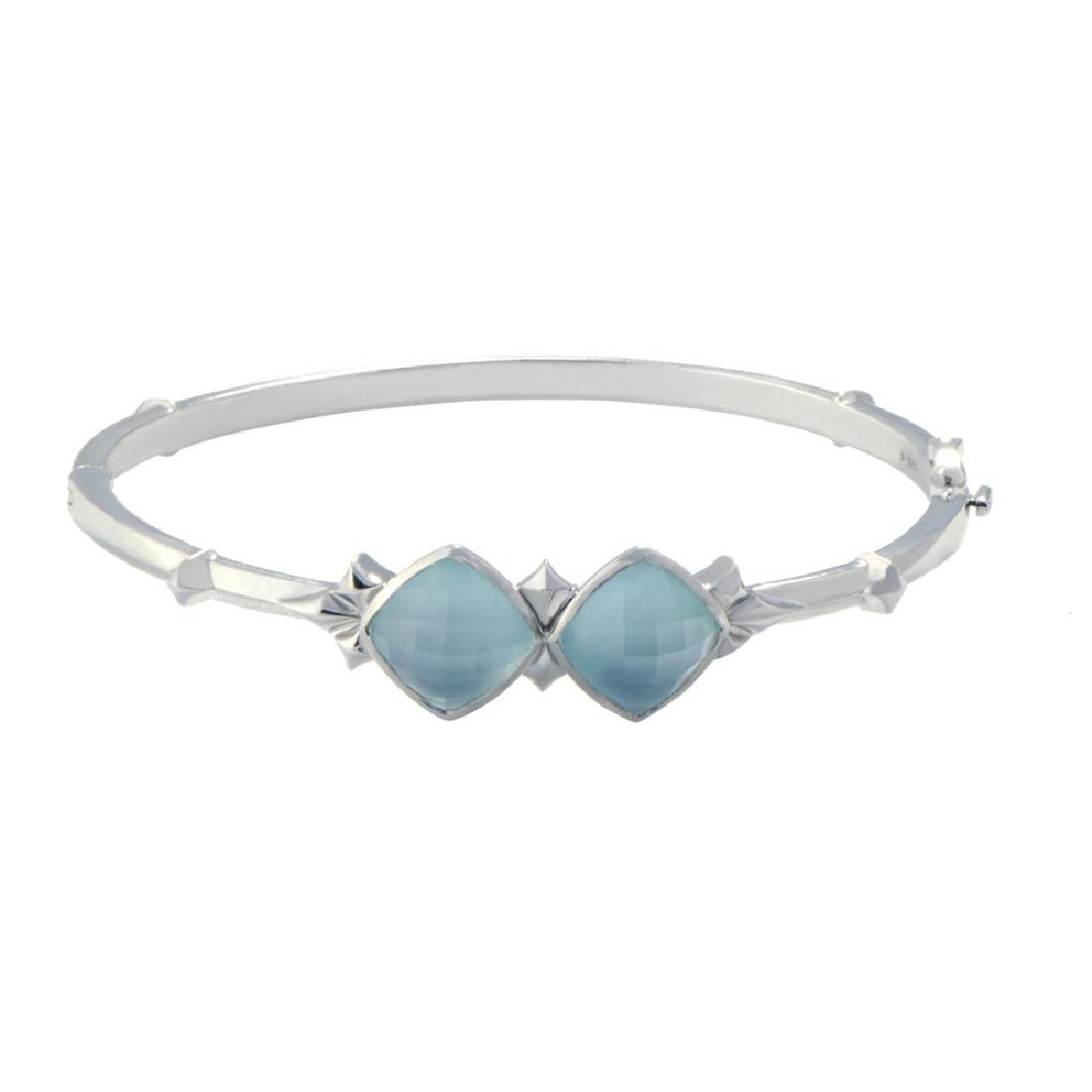 Stephen Webster Womens Silver Cat's Eye and Quartz: Blending pleasant cat's eye and quartz stones with tender mother of pearl, Stephen Webster perfectly matched the gentle spirit of white rhodiumplated silver in this remarkable bangle from the reno