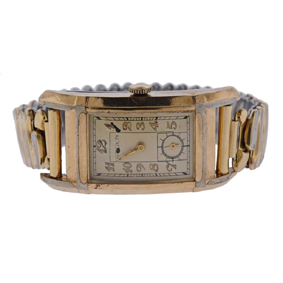 Gruen Vintage Manual wind Wrist Watch: Metal Content:Base MetalDial: Eggshell color Gruen signed dial, with applied markers, small second hand dial at 6 o'clock position.Size: Case measures 20mm x 45mm from lug end to lug end. Stretch