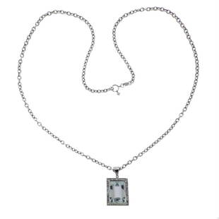 Platinum 16.98 Carat Aquamarine Diamond 18k Necklace: Metal Content: 18k Gold (chain) ; Platinum (pendant)Weight of Item: 22.3 gramsSize: Length of the necklace - 23.5", pendant - 30mm x 18mm. Gemstone: Aquamarine, DiamondCarat Weight: 16.985ct ;