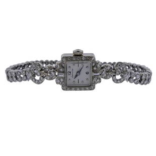Hamilton 14k Gold Diamond Watch: Metal Content: 14k Gold Weight of Item: 19.9 gramsSize: Case 14.5mm x 35mm. Band length - 6 3/8". Gemstone: Diamond (2.00ctw)Movement: Manual Wind. Working order. Marks: Hamilton, 14k gold.