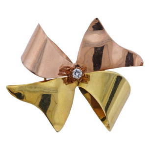 Retro Two Tone 14K Gold Diamond Bow Pin: Metal Content: 14K yellow/rose goldWeight of Item: 6.3 grams.Size: 1 7/8" x 1 1/2"Gemstone: DiamondStamp: polished off, tested 14K