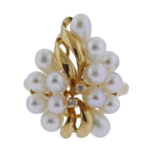 14K Gold Pearl Diamond Cluster Ring: Metal Content: 14K goldWeight of Item: 4.1 gramsSize: ring size 6. Top of the ring 22mmGemstone: Pearls, DiamondsStamp: 14K