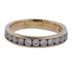 14K Gold Diamond Wedding Band Ring: Metal Content: 14K goldWeight of Item: 3.5 gramsSize: Ring size 8.75. Band is 3.5mm wideGemstone: DiamondsCarat Weight: approx.0.70ctwStamp: 14K