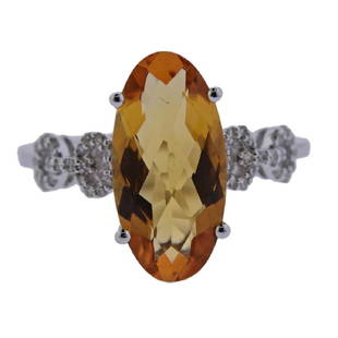14k Gold Diamond Citrine Ring: Metal Content: 14k Gold Weight of Item: 3.4 gramsSize: Ring size 7.25, width of the ring - 15mm.Gemstone: Citrine, Diamond.Carat Weight: 3.50ct; 0.13ctw.Stamp: 14k, TD.