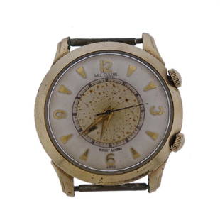 LeCoultre Wrist Alarm Vintage Watch: Metal Content: 10k Gold Filled Dial: Gold tone dial (discoloration specks present). Size: Diameter of the case 35mm.Movement: Manual wind. Working order, Alarm feature working. Needs service. Marks: 1