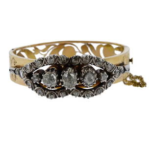 18k Gold Silver 3 Carat Diamond Bracelet: Metal Content: 18k Gold/ Silver. Weight of Item:47.8 grams.Size: Side to side measurements - 2 5/16" x 1 11/16". Width - 3/4". Gemstone: Rose Cut Diamond.Carat Weight: 3.00ctw.Stamp: