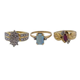 10k and 14k Gold Opal Ruby Diamond Ring Lot 3 pcs: Metal Content: 10k (two rings) and 14k Gold (one ring).Weight of Item: Total 7.9 grams.Size: Ring sizes - 6.5; 8 and 6.25. Gemstone: Opal, Ruby, Diamond.Stamp:14k, 10k.