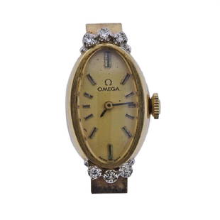 Omega 14k Gold Diamond Watch Head: Metal Content: 14k Gold. Dial: Omega signed gold tone dial with applied stick markers. Weight of Item: 8.8 grams.Size: 13.5mm x 28mm. Movement: Manual Wind. Non running order. Triple signed.