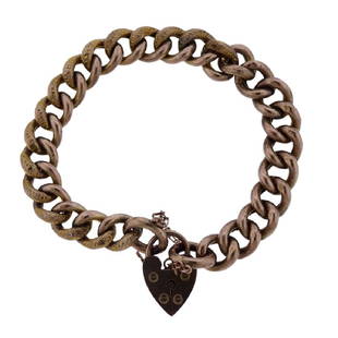 Victorian English 9K Gold Padlock Chain Bracelet: Metal Content: 9k goldWeight of Item: 17..3 gramsSize: bracelet is 7.5" long x 10 mm wide. Padlock charm-21.5 x 13.5mmStamp: M P G 9Ct