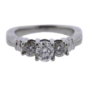 Zei Platinum Diamond Engagement Ring: Metal Content: PlatinumWeight of Item: 7.1 gramsSize: Ring size 6. Top of the ring 5mmGemstone: DiamondsCarat Weight: approx. 0.90ctwStamp: Pt950 ZEI