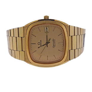Omega Seamanster Quartz Wrist Watch: Metal Content: Gold Tone Stainless Steel.Dial: Gold tone signed Omega, with applied gold stick markers, date at 3 o'clock position.Size: Case - 34.5mm x 34mm. Band (shows peeling throughout) -