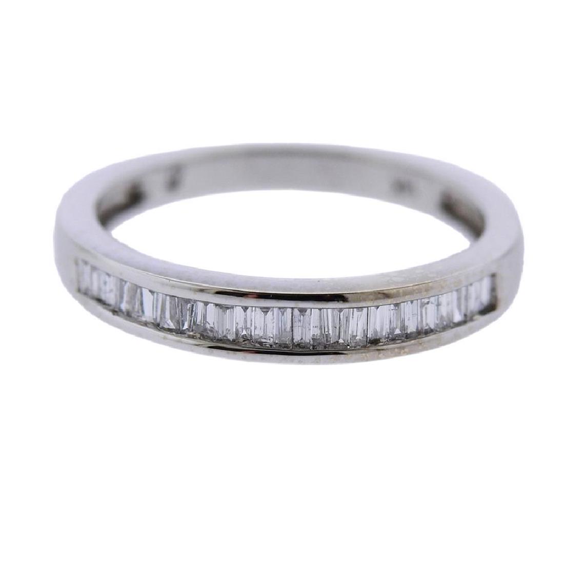 14k Gold Baguette Diamond Wedding Band Ring: Metal Content: 14k Gold. Weight of Item: 2.1 grams.Size: Ring size - 7 1/4. Width - 3mm. Gemstone: Baguette diamonds. Carat Weight: approx. 0.24ctw.Stamp: 14k.