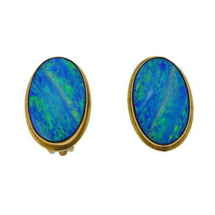 14K Gold Opal Earring: Metal Content: 14k Gold.Weight of Item: 7.2 grams.Size: 19.7mm x 14mm.Gemstone: Opal.Stamp: 14k PAT. 156452.