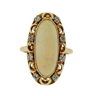 Antique 14K Gold Diamond Opal Ring: Metal Content: 14k Gold.Weight of Item: 5.1 grams.Size: Ring size 6. Top is 25mm.Gemstone: Diamonds. Opal.Carat Weight: approx. 0.16ctw.Stamp: Tested 14k.