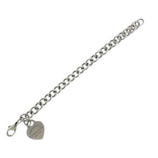 Tiffany & Co Return To Silver Heart Charm Bracelet: Metal Content: Sterling Silver.Weight of Item: 33.8 grams.Size: Bracelet is 8" long, width 10mm.Heart charm - 25mm x 21mm.Stamp: Please Return To Tiffany & Co 925, New York.