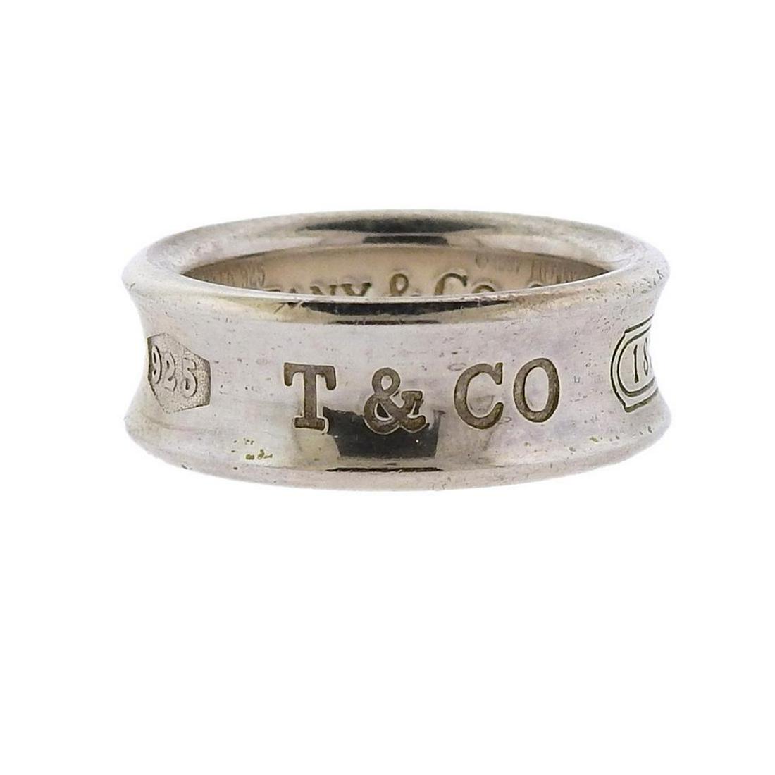 Tiffany & Co 1837 Sterling Silver Band Ring: Metal Content: Sterling Silver.Weight of Item: 7.3 grams.Size: Ring is 5 1/2, width 7mm.Stamp: 1997 Tiffany & Co. 925.