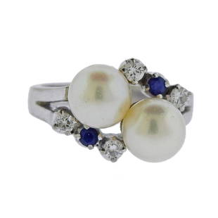 14K Gold Diamond Pearl Sapphire Ring: Metal Content: 14k Gold.Weight of Item: 6.5 grams.Size: Ring size 6 1/2, ring top - 12.7mm at widest point.Gemstone: Pearls - 7.7mm. Diamonds. Sapphire.Carat Weight: approx. - 0.20ctw.Stamp: 14k