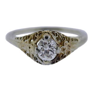 Art Deco 18k Gold Diamond Engagement Ring: Metal Content: 18k Gold. Weight of Item: 2.3 grams.Size: Ring size - 7 1/2, top - 8mm wide.Gemstone: Old European diamond.Carat Weight: approx. 0.62ct.Stamp: 18k.