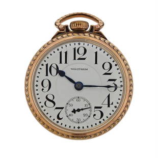 Waltham Gold Filled Pocket Watch: Metal Content: 10k Gold Filled. Dial: Double sunk porcelain dial with black markers, sub-dial at 6 o&#39;clock. Multiple hairlines are present.Size: Diameter of the case - 50mm. Movement: manual wind,