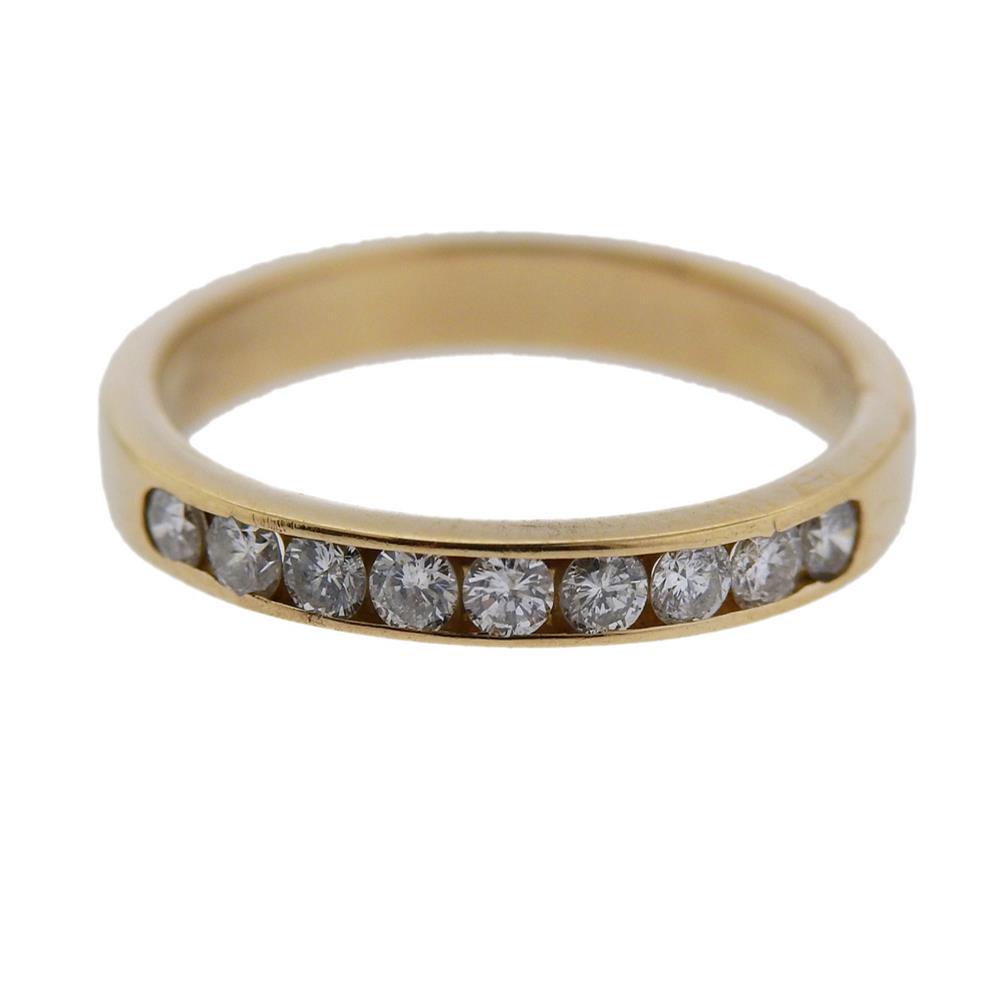14k Gold Diamond Wedding Band Ring: Metal Content: 14k Gold. Weight of Item: 2 grams.Size: Ring size - 5.75. width - 2.5mm.Gemstone: Diamonds. Carat Weight: approx. 0.25ctw.Stamp: 14k.
