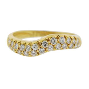 Van Cleef & Arpels 18K Gold Diamond Wave Ring: Metal Content: 18k Gold.Weight of Item: 2.3 grams.Size: Ring size 4 1/2, ring band - 4mm at widest point.Gemstone: Diamonds.Carat Weight: approx. 0.38ctw.Stamp: VCA 18KT, 0.38, A68, B5381, Hallmarks.