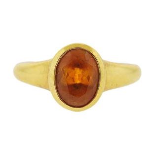 Bvlgari Bulgari 18K Gold Citrine Ring: Metal Content: 18k Gold.Weight of Item: 5.2 grams.Size: Ring size 5 1/2, ring top - 10.5mm wide.Gemstone: Citrine - 9 x 6.5 x 5mm. Stamp: Bvlgari 750, 1070AL.