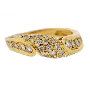 Piaget 18K Gold Diamond Ring: Metal Content: 18k Gold.Weight of Item: 5 grams.Size: Ring size 5 3/4, ring top - 5.9mm at widest point. Gemstone: Diamonds.Carat Weight: approx. 0.85ctwStamp: Piaget 18k, 085.