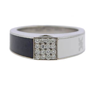 Korloff 18K Gold Diamond White Black Enamel Ring: Metal Content: 18k Gold. Weight of Item: 6.5 grams.Size: Ring size 4, ring top - 5.9mm wide.Gemstone: Diamonds. Black and white enamel.Carat Weight: 0.15ctw. Stamp: Maker's symbol K 750.