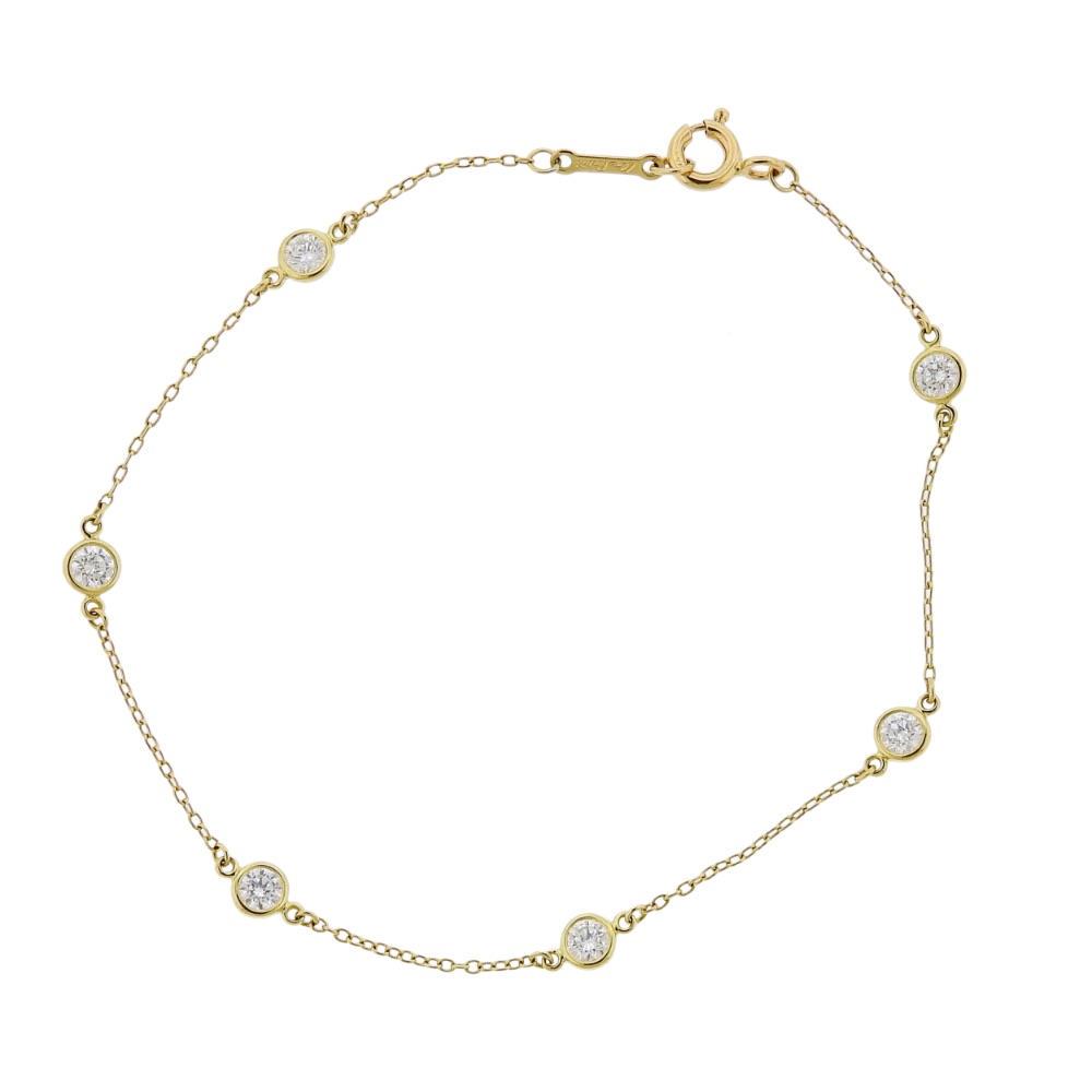 Tiffany & Co Peretti 18K Gold Diamonds by the Yard: Metal Content: 18k Gold.Weight of Item: 1.3 grams.Size: Bracelet is 7" long.Gemstone: Diamonds.Carat Weight: approx. 0.60ctw.Stamp: T & Co 750, Elsa Peretti.