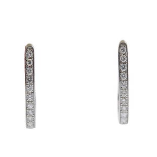 14K Gold Diamond Oval Hoop Earrings: Metal: 14k White Gold.Weight of Item: 4 grams.Size: Earrings are 23mm long x 3mm wide.Gemstone: Diamonds approx. 1.00ctwStamp: 14kT