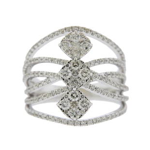 14K Gold Diamond Wide Band Crossover Ring: Metal Content: 14k White Gold.Weight of Item: 7 grams.Size: Ring is 6 3/4, ring top 21mm wide.Gemstone: Diamonds.Carat Weight: approx. 1.51ctw.Stamp: 14K Maker's mark.