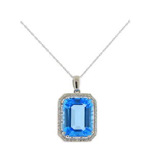 14K Gold Diamond Topaz Pendant Necklace: Metal Content: 14k White Gold.Weight of Item: 4 grams.Size: Necklace is 18" long. Pendant - 25mm long with bale x 14mm wide.Gemstone: Diamonds. Topaz - 14 x 10 x 6.4mm.Carat Weight: approx.