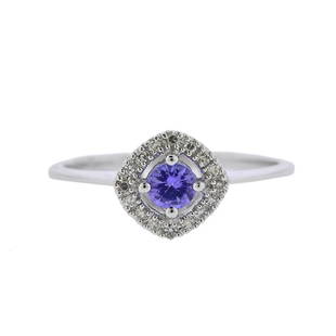 14K Gold Diamond Tanzanite Ring: Metal Content: 14k White Gold.Weight of Item: 2 grams.Size: Ring is 7, ring top - 9.2mm at widest point.Gemstone: Diamonds. Tanzanite - 4mm.Carat Weight: approx. 0.08ctw.Stamp: 14K ID.