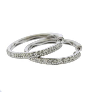 14K Gold Diamond Hoop Earrings: Metal Content: 14k White Gold.Weight of Item: 8 grams.Size: Earrings are 33mm x 2.9mm. (one post is bent).Gemstone: Diamonds.Carat Weight: approx. 1.00ctw.Stamp: 14KT, AV IX.