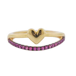 14K Gold Ruby Heart Ring: Metal Content: 14k Yellow Gold.Weight of Item: 2.5 grams.Size: Ring is 7 1/4, ring top - 7.5mm at widest point.Gemstone: Rubies.Carat Weight: approx. 0.25ctw.Stamp: 14K IDJ.