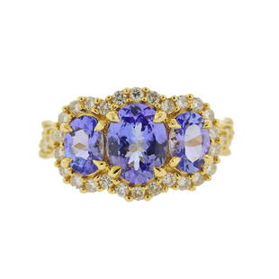 14K Gold Diamond Tanzanite Ring: Metal Content: 14k Yellow Gold.Weight of Item: 8 grams.Size: Ring is 7, ring top - 12.8mm at widest point.Gemstone: Diamonds. Tanzanite approx. 3.10ctw.Carat Weight: approx. 0.84ctw.Stamp: 14K.