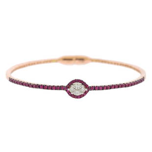 18K Gold Diamond Ruby Bangle Bracelet: Metal Content: 18K Gold.Weight of Item: 9 grams.Size: Inner diameter of the almond magnet bracelet is 55mm x 47mm. Gemstone: Diamonds, Rubies approx. 0.72ctw.Carat Weight: 0.20ctw.Stamp: 18KT 4552.