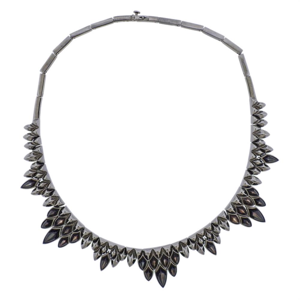 Stephen Webster Superstud Silver Black Rhodium Mother: Metal Content: Sterling Silver.Weight of Item: 74 grams.Size: Necklace is 16' long x 21mm at widest point.Gemstone: Black Mother of Pearl.Stamp: SW 925.